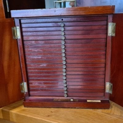 A mahogany coin cabinet, ex Baldwin