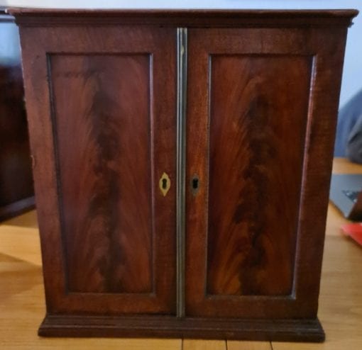 A wonderful mahogany coin cabinet, ex Baldwin, size approx 36 x 33 x 28cm