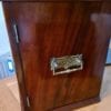 Antique Coin Cabinet A stunning mahogany coin cabinet, ex Baldwin values, size approx 30 x 39 x 30cm, comprising 27 trays double-pierced