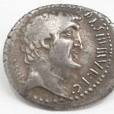 The Triumvirs. Mark Antony. Summer 32 BC. Silver Denarius. Athens mint. M. Junius Silanus, proconsul. Bare head of Antony right; small P (engraver's signature) in hair behind ear